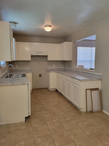 6055 Green Heather Lane, Houston, TX 77085