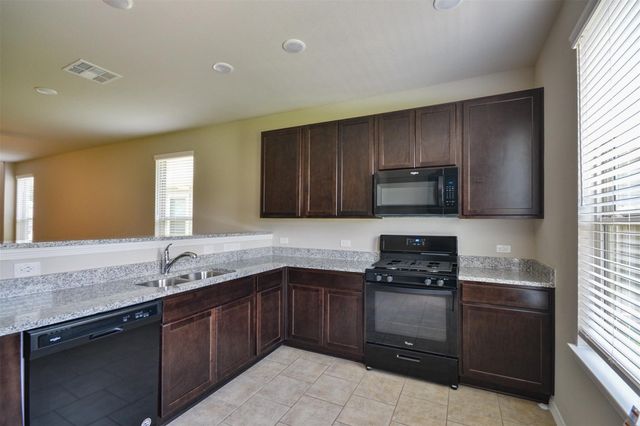 24810 Winema Woods Lane, Huffman, TX 77336