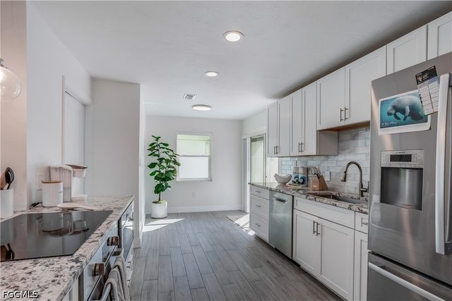 718 103rd AVE N, Naples, FL 34108