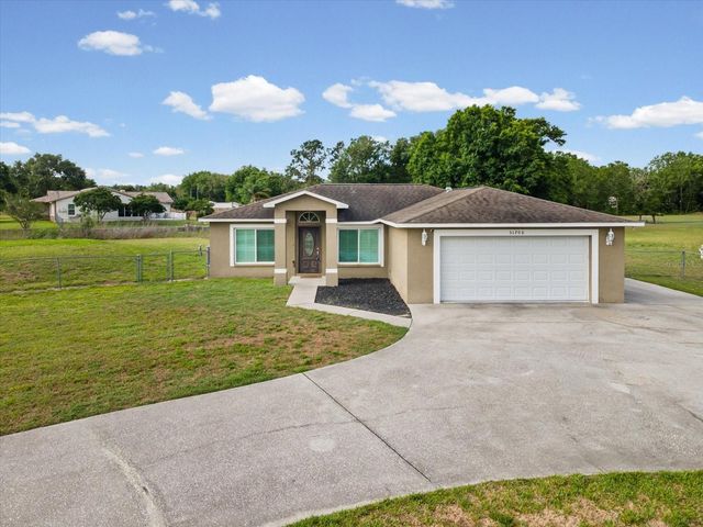 31706 HUNT CLUB LANE, Wesley Chapel, FL 33543