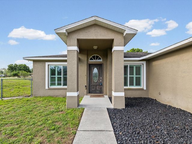 31706 HUNT CLUB LANE, Wesley Chapel, FL 33543