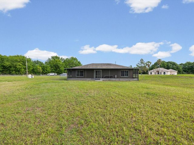 31706 HUNT CLUB LANE, Wesley Chapel, FL 33543