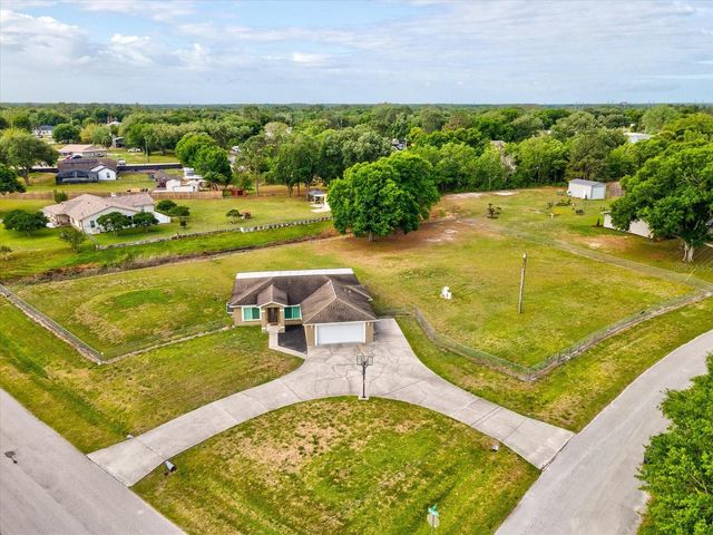 31706 HUNT CLUB LANE, Wesley Chapel, FL 33543