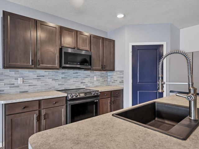 10003 GEESE TRAIL CIRCLE, Sun City Center, FL 33573