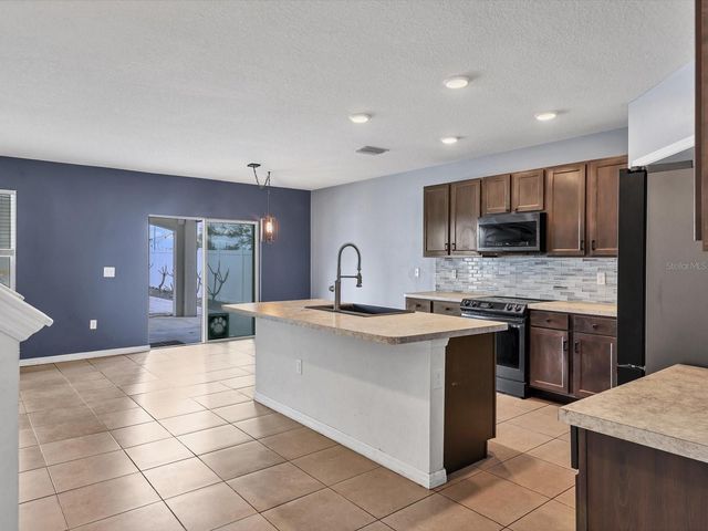 10003 GEESE TRAIL CIRCLE, Sun City Center, FL 33573