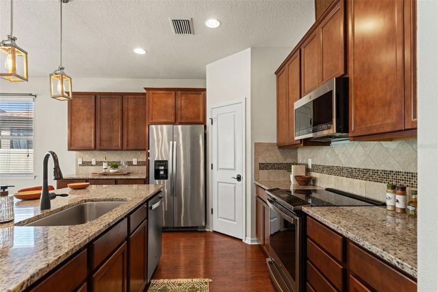 8296 OLIVE BROOK DRIVE, Wesley Chapel, FL 33545