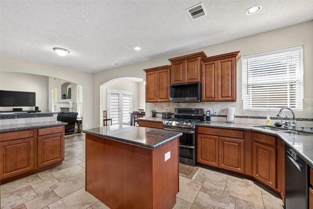 9642 Keeneland Circle, Mont Belvieu, TX 77523