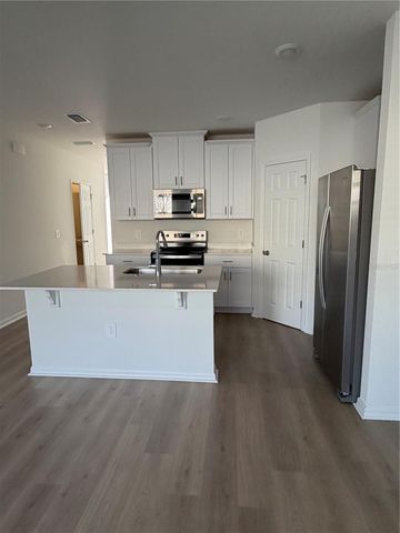 16306 BIRD OF PARADISE AVENUE, Clermont, FL 34714