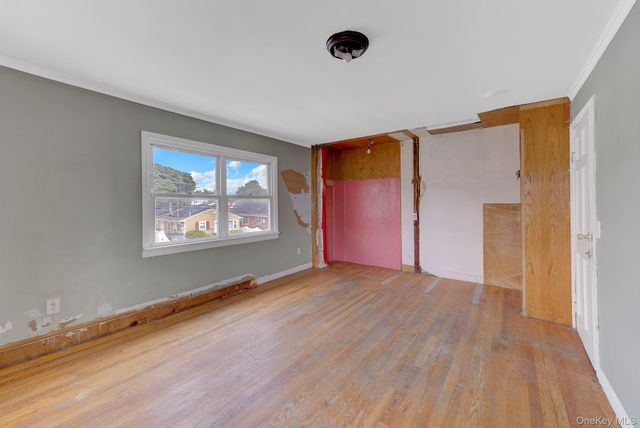 104 E Pennywood Avenue, Roosevelt, NY 11575