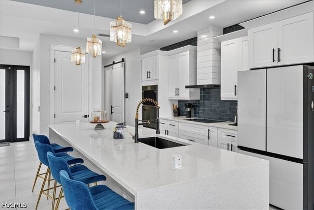 1013 Chaplin AVE, Lehigh Acres, FL 33971