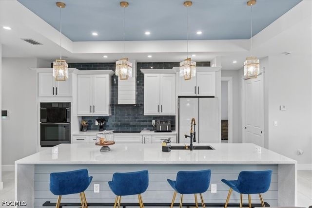 1013 Chaplin AVE, Lehigh Acres, FL 33971