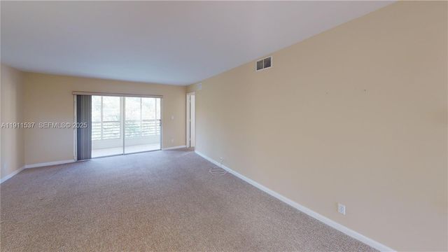 9301 Sunrise Lakes Boulevard 303, Sunrise, FL 33322