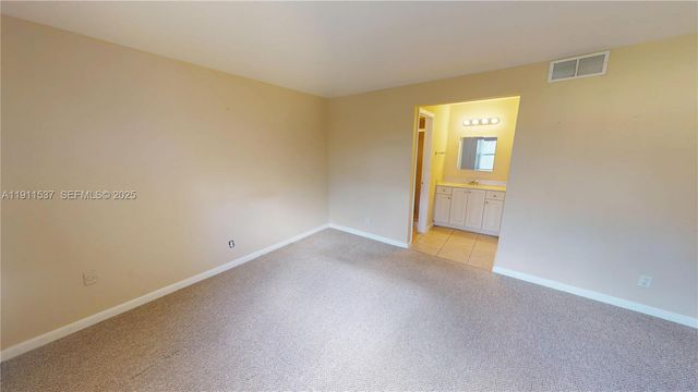 9301 Sunrise Lakes Boulevard 303, Sunrise, FL 33322