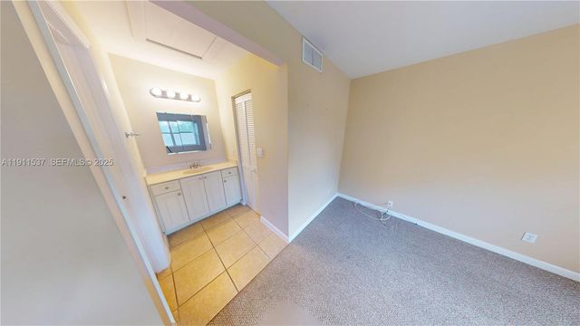 9301 Sunrise Lakes Boulevard 303, Sunrise, FL 33322