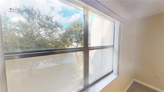 9301 Sunrise Lakes Boulevard 303, Sunrise, FL 33322