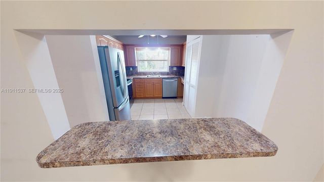 9301 Sunrise Lakes Boulevard 303, Sunrise, FL 33322