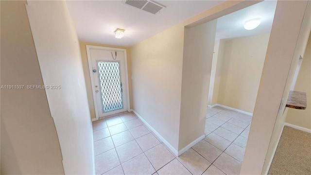 9301 Sunrise Lakes Boulevard 303, Sunrise, FL 33322