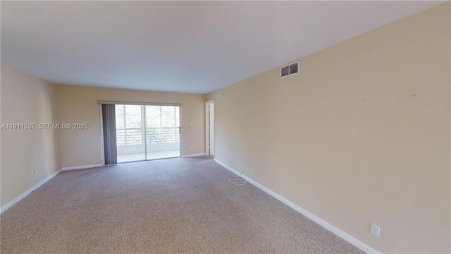 9301 Sunrise Lakes Boulevard 303, Sunrise, FL 33322