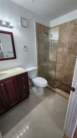 210 E Palm Circle E, Pembroke Pines, FL 33025