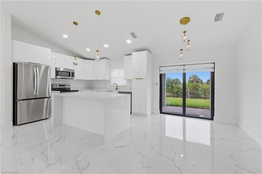 2201 NE 10TH PL, CAPE CORAL, FL 33909 — photo 5