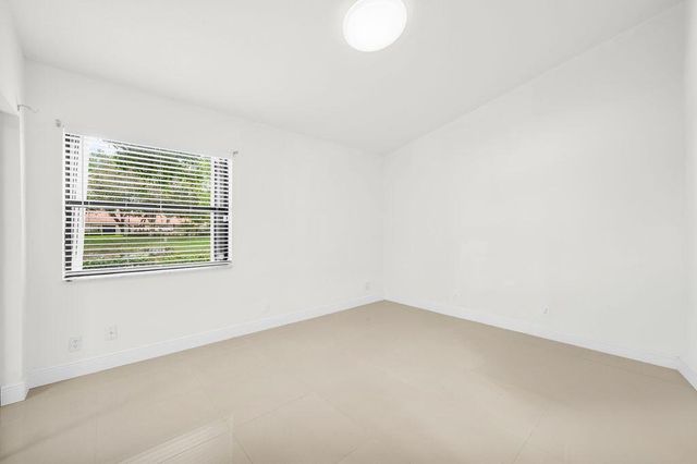 65 Centennial Court, Deerfield Beach, FL 33442