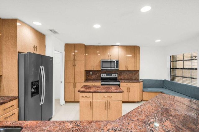 65 Centennial Court, Deerfield Beach, FL 33442