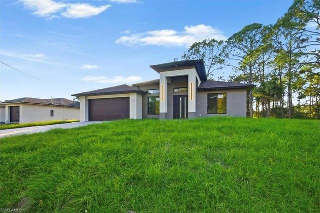 911 Cleveland AVE, Lehigh Acres, FL 33972