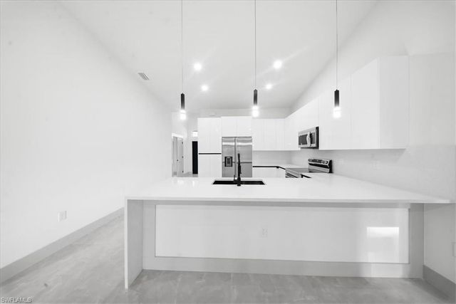 911 Cleveland AVE, Lehigh Acres, FL 33972