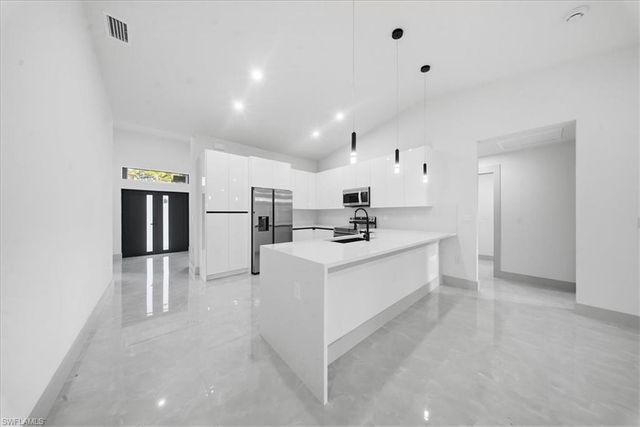 911 Cleveland AVE, Lehigh Acres, FL 33972