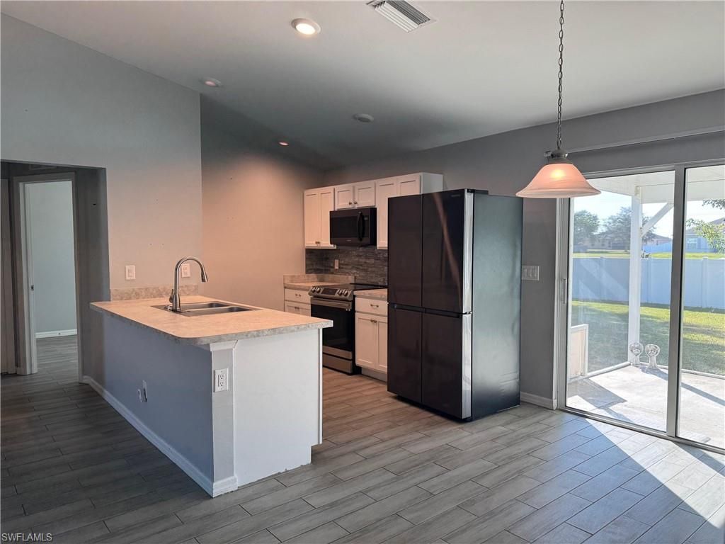 202 NW 27th AVE, CAPE CORAL, FL 33993 — photo 2