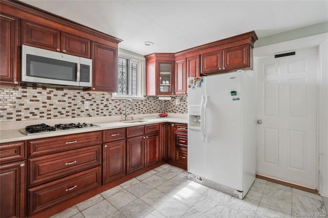 2310 102nd Street, East Elmhurst, NY 11369