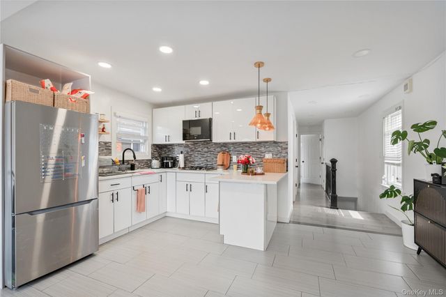 2310 102nd Street, East Elmhurst, NY 11369