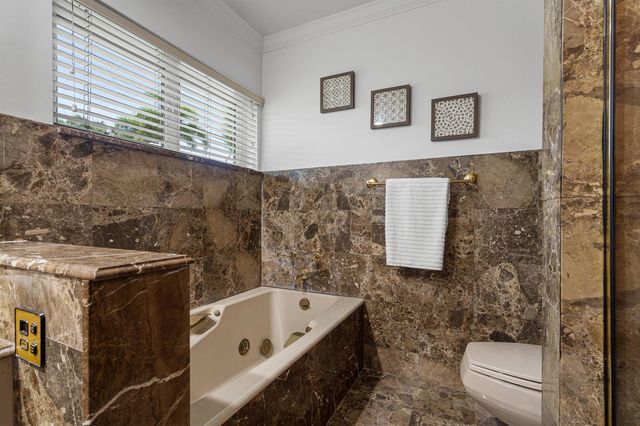 57 Cayuga Road, Sea Ranch Lakes, FL 33308