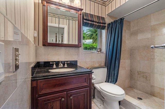 57 Cayuga Road, Sea Ranch Lakes, FL 33308