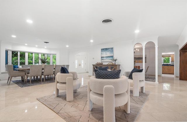 57 Cayuga Road, Sea Ranch Lakes, FL 33308