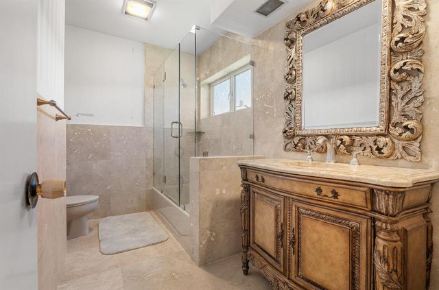 57 Cayuga Road, Sea Ranch Lakes, FL 33308