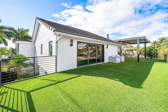 737 NE Boca Bay Colony Drive, Boca Raton, FL 33487