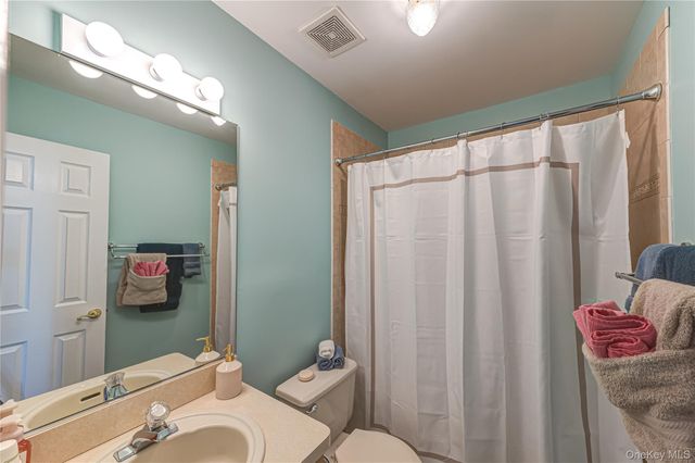 166 Grassy Pond Drive S, Smithtown, NY 11787