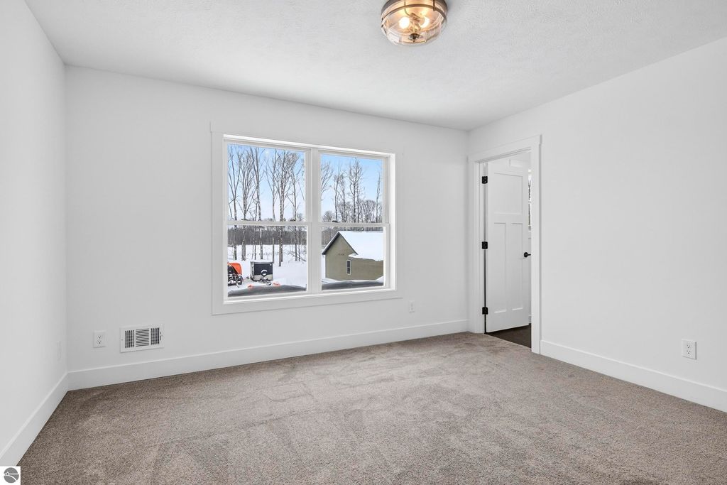 Image 23 of property listing at 2134 Cottonwood Avenue, Grawn, MI 49637