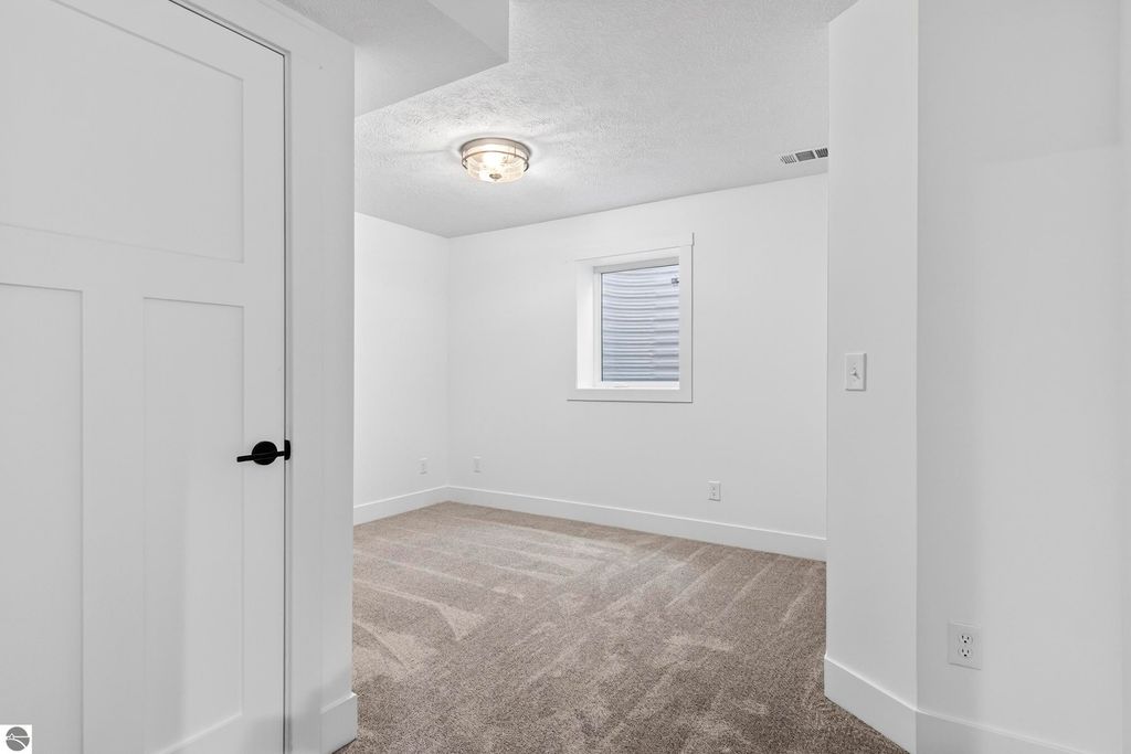 Image 30 of property listing at 2134 Cottonwood Avenue, Grawn, MI 49637