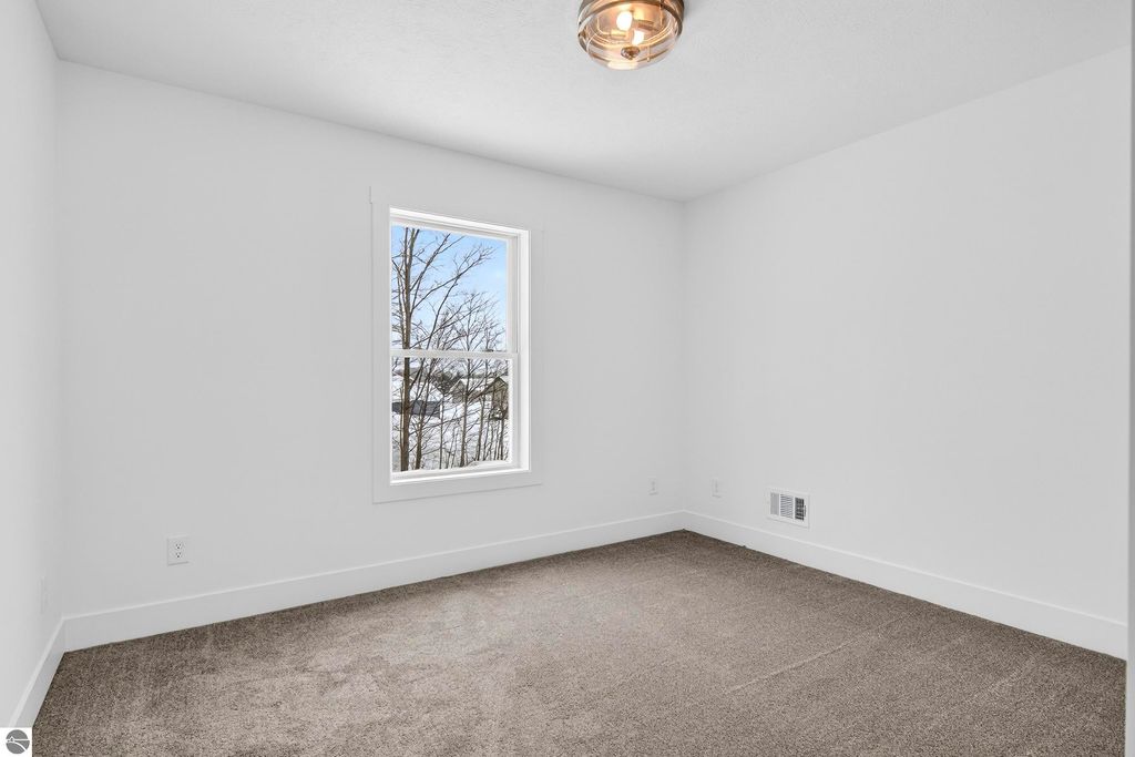 Image 33 of property listing at 2134 Cottonwood Avenue, Grawn, MI 49637