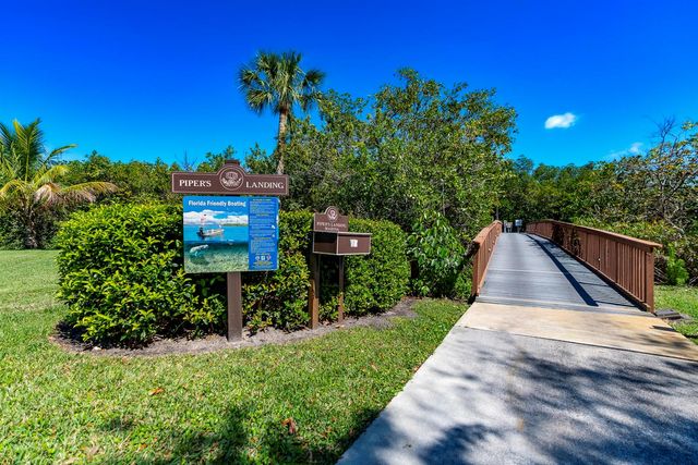 1543 SW Troon Circle, Palm City, FL 34990