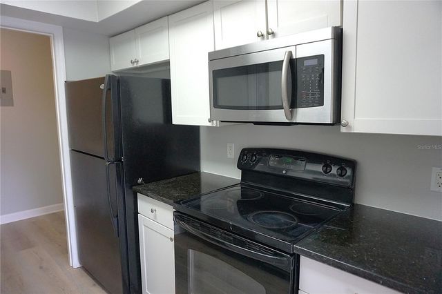 5971 WINDHOVER DRIVE 7E, Orlando, FL 32819