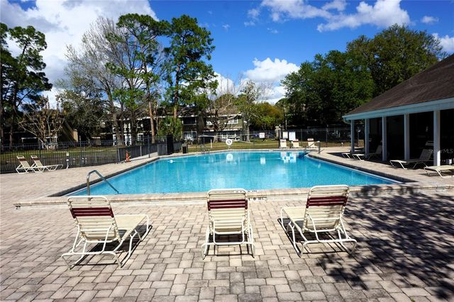 5971 WINDHOVER DRIVE 7E, Orlando, FL 32819