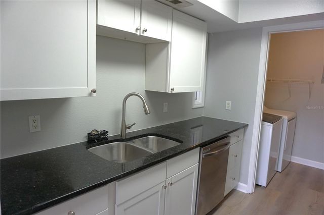 5971 WINDHOVER DRIVE 7E, Orlando, FL 32819