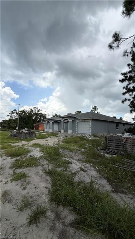 1077 Jaguar BLVD, LEHIGH ACRES, FL 33974 — photo 2