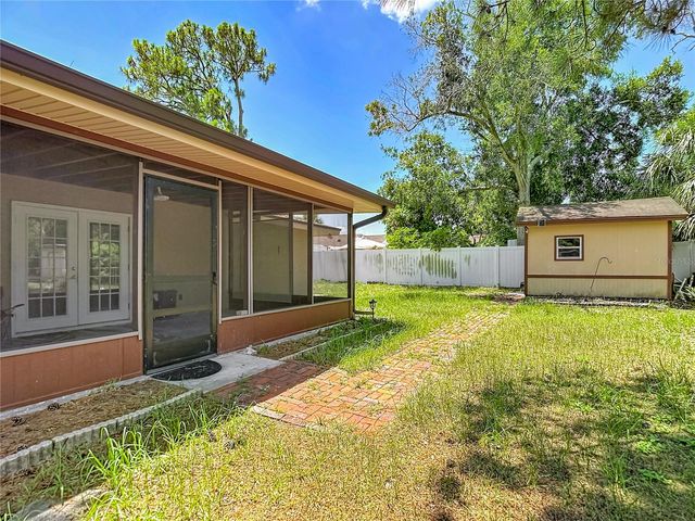 7916 WOODGROVE CIRCLE, Tampa, FL 33615