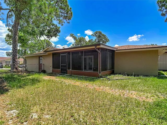 7916 WOODGROVE CIRCLE, Tampa, FL 33615