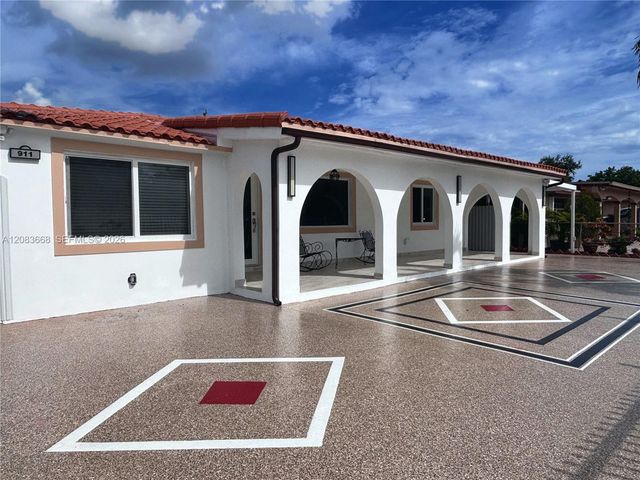 911 NW 30th Place 911, Miami, FL 33125