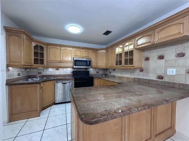 911 NW 30th Place 911, Miami, FL 33125